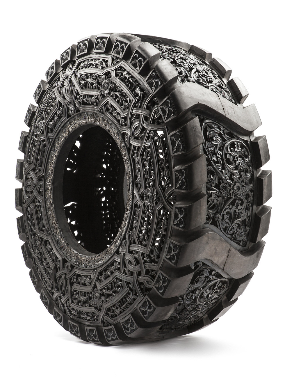 Untitled, 2010 hand carved car tyre 71 x 14 cm